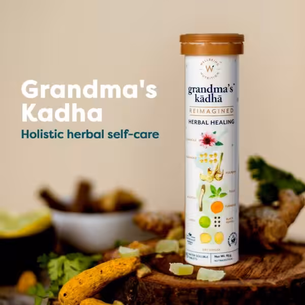 Grandma's Kadha: Holistic herbal self-care. Product tube listing ingredients including turmeric, ginger, and tulsi