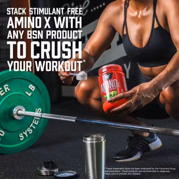 Stack stimulant free Amino X with any BSN product to crush your workout. A woman in a gym prepares the supplement