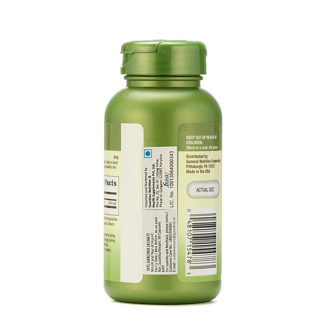 Back label of a green Garcinia supplement bottle showing manufacturer info, barcode, and 90 capsules quantity