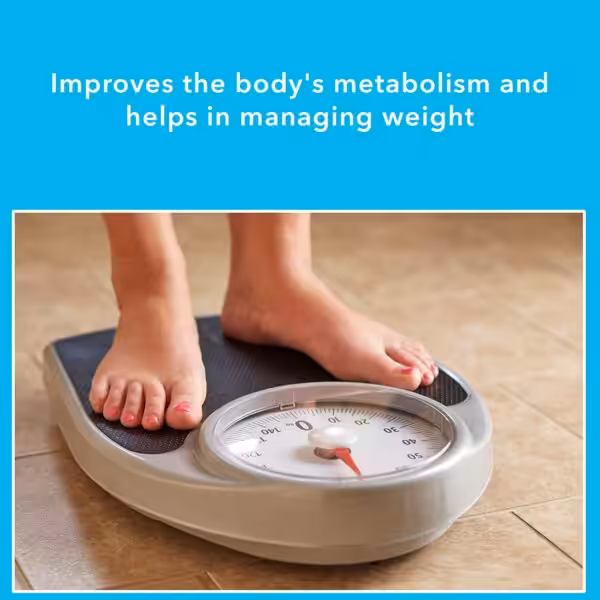 Improves the bodys metabolism and helps in managing weight. A person standing on a bathroom scale
