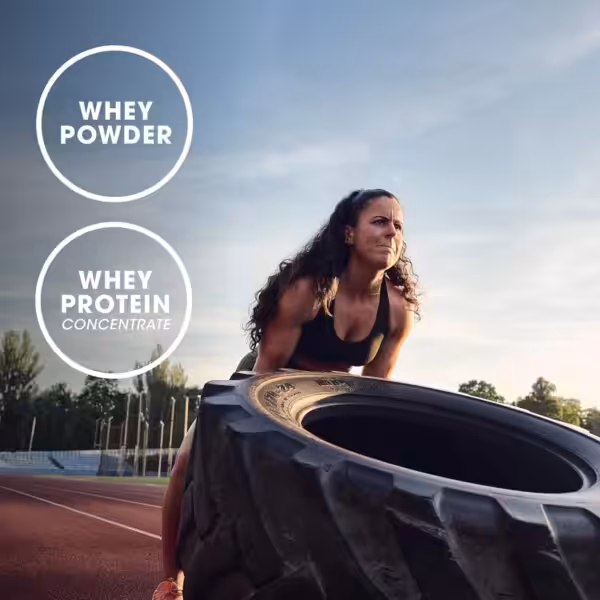 A woman flips a large tire on an outdoor track. Text: Whey Powder, Whey Protein Concentrate