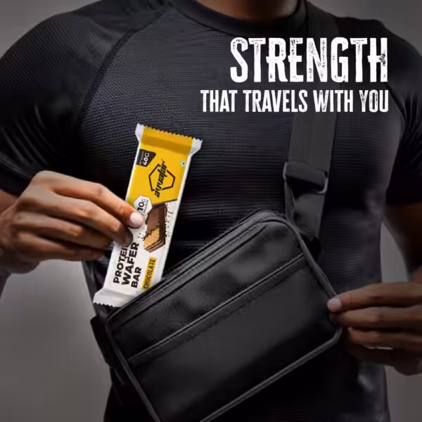 Strength that travels with you. A person puts an Avvatar Protein Wafer Bar into a small shoulder bag