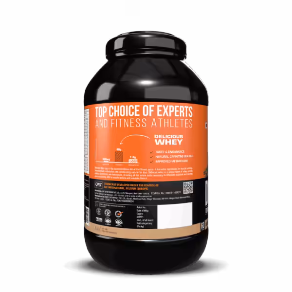 QNT Delicious Whey protein powder tub with label highlighting 48g protein, 400mg betaine, and 1.8g glutamine