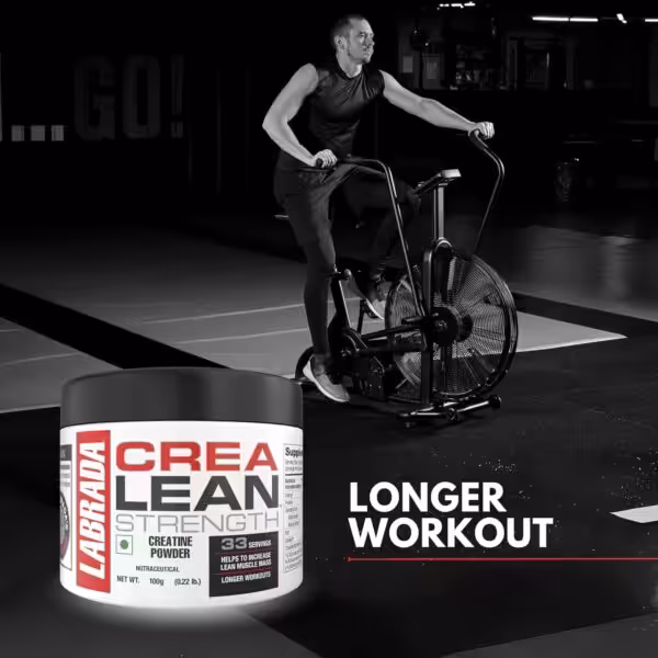 Labrada CreaLean Strength Creatine Powder for longer workouts, with a man training on an air bike