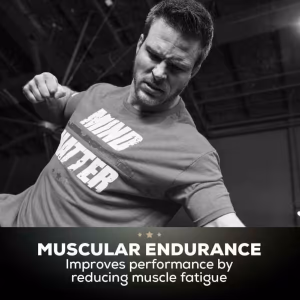 Muscular Endurance: Improves performance by reducing muscle fatigue. A man in a Mind Matter shirt works out