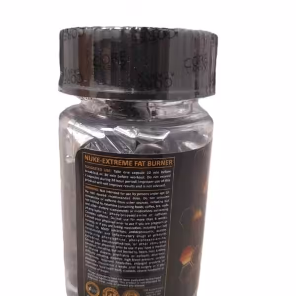 Nuke-Extreme Fat Burner supplement bottle label showing suggested use and warning information
