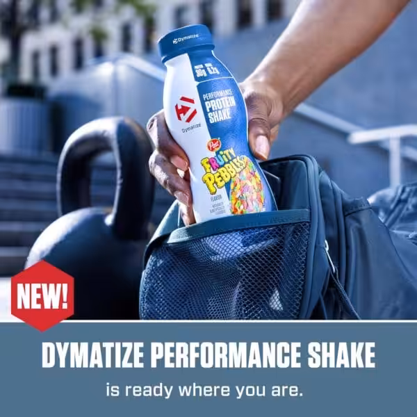 New! Dymatize Performance Protein Shake in Fruity Pebbles flavor being placed into a gym bag next to a kettlebell