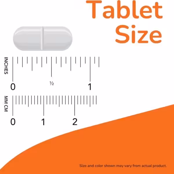 Tablet size approximately 3/4 inch (about 2 cm) long, shown against a ruler scale in inches and centimeters