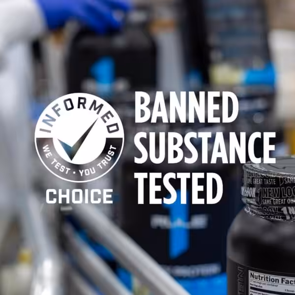 Informed Choice certified — Banned Substance Tested, with supplement bottles on a manufacturing line in the background