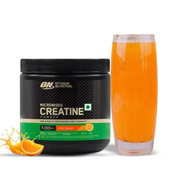 Optimum Nutrition Micronised Creatine Powder, Citrus Orange flavor, shown with a glass of the mixed drink