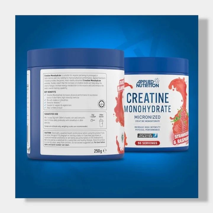Two blue and white containers of Applied Nutrition Creatine Monohydrate are visible, with the left container displaying its detailed information label and the right container showing its strawberry and raspberry flavor on the front.