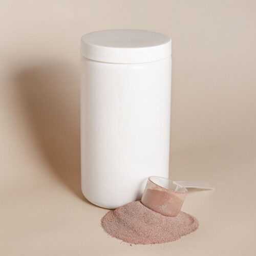 Unlabelled supplement tub with a scoop of powder for choosing the best mass gainer